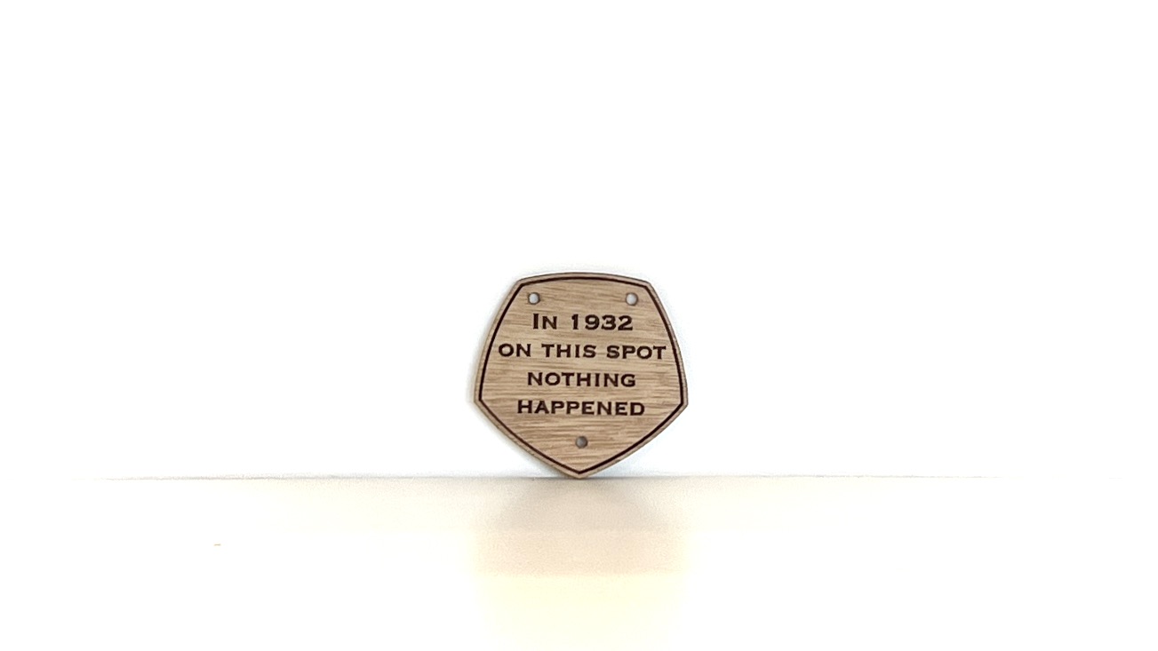 Nothing happened wooden laser engraved small sign approx 8cm diameter